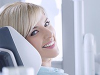 Smiling woman in dental chair