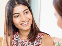 Woman with ceramic braces