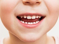 Closeup of child's healthy smile