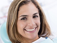 Smiling woman in dental chair