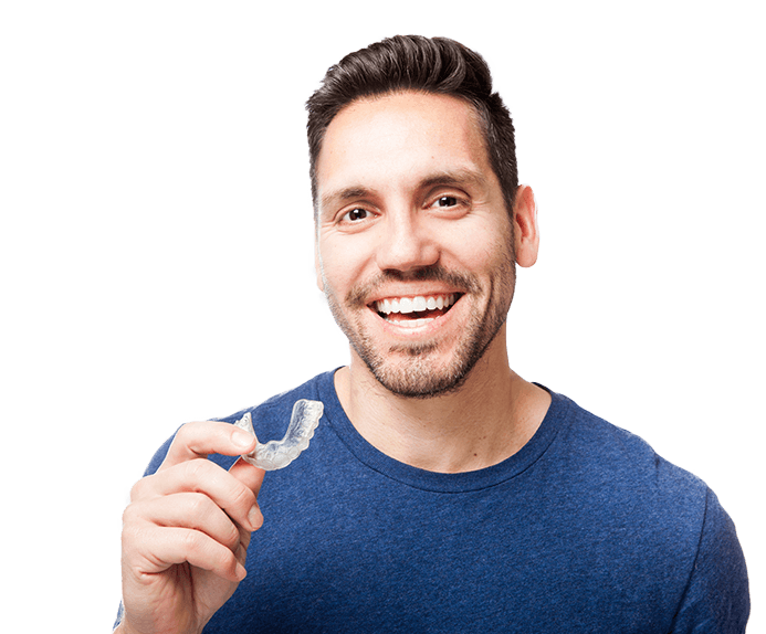 Man holding Invisalign tray