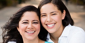 Two women with beautiful smiles