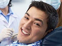 Smiling man in dental chair