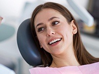 Smiling woman in dental chair