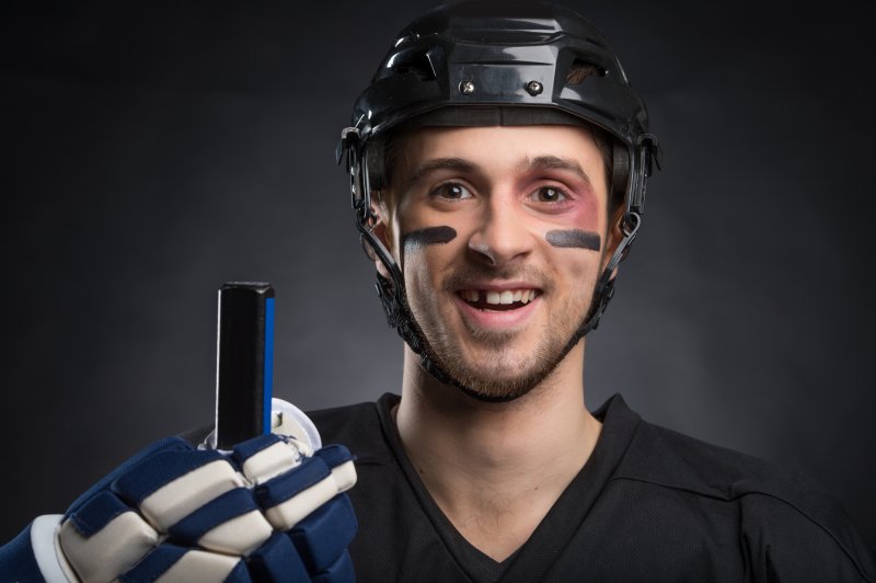 Man with knocked-out tooth