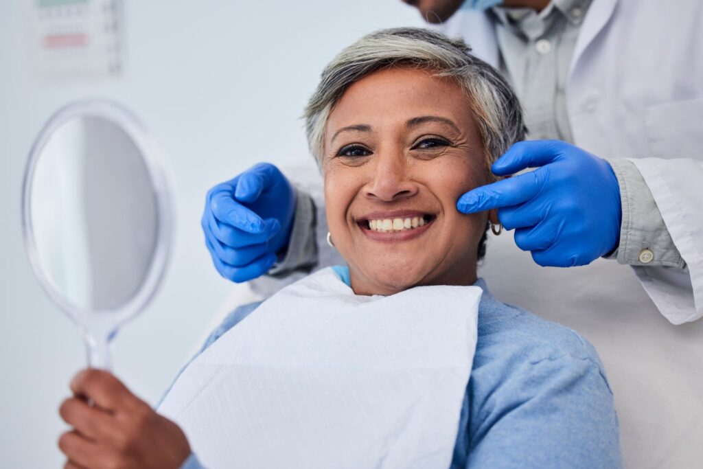 A woman at the dentist getting a cosmetic dentistry treatment